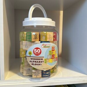 First learning wooden alphabet blocks